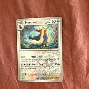 Stoutland Pokémon Card with Abilities